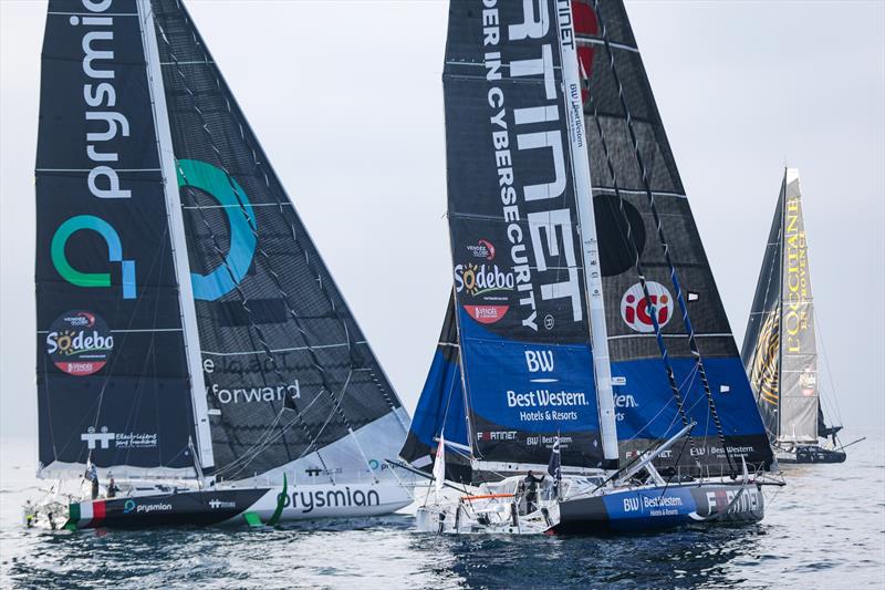 Romanin Attanasio (Best Western) and Giancarlo Pedote (Prysmian) - Start Vendee Globe - Les Sables d'Olonne - IMOCA60 - November 10, 2024 - photo © Lloyd Images