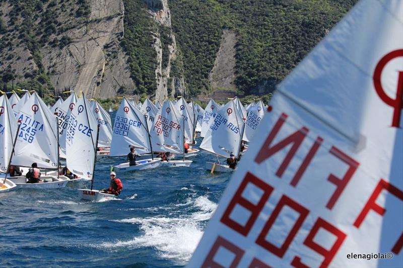 32nd Lake Garda Optimist Easter Regatta day 1 at World Youth Sailing Week photo copyright Elena Giolai taken at Fraglia Vela Riva and featuring the Optimist class