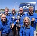 The crew of DasherplusFisher How Bizarre with the prestigious Rudder Cup  - 2024 Melbourne to Devonport Rudder Cup © Al Dillon