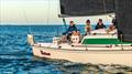 Will on the helm of his father's boat Valiant © Tom Smeaton