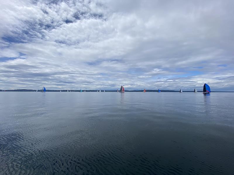 Watching the fleet approach the turning mark on the final miles of the 2024 Blake Island Race photo copyright David Schmidt taken at Seattle Yacht Club and featuring the ORC class