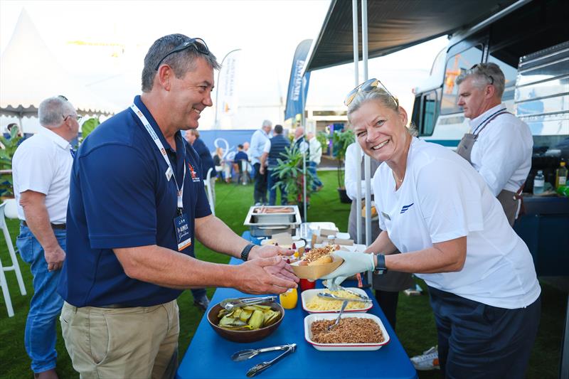 Michaela serving up hot dogs at the Sanctuary Cove International Boat Show photo copyright Salty Dingo taken at  and featuring the  class