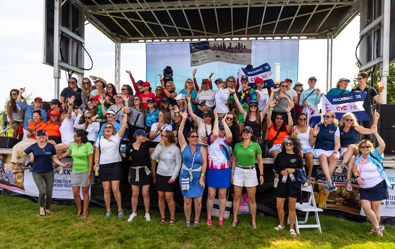 Sailors celebrate after the 116th Chicago Yacht Club Race to Mackinac presented by Wintrust photo copyright Anna Suslova Media taken at Chicago Yacht Club and featuring the PHRF class