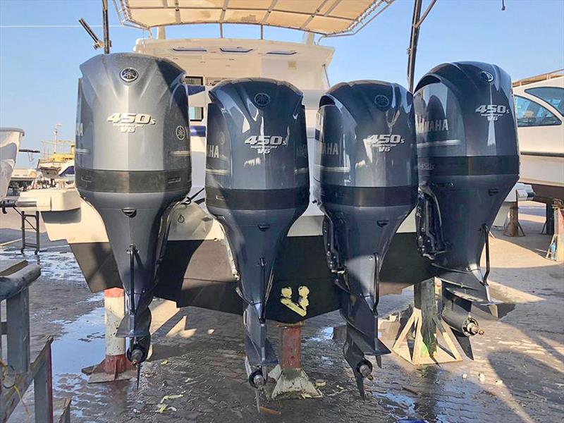 Finalising installation of the four Nizpro Marine 450s outboards on the Al Hareb Marine 56-footer - photo © Al Murzem Tradin