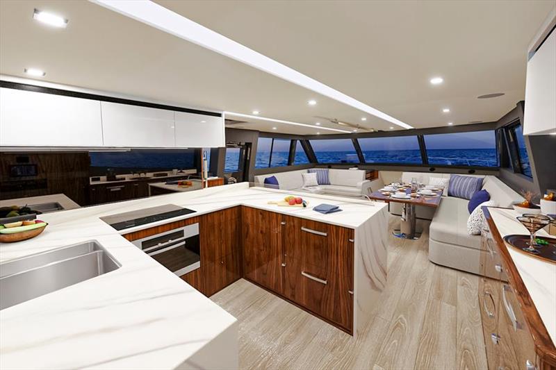 The U-shaped aft galley of the 72 Series II is an inspiring space, superbly equipped with premium appliances beautifully integrated into handcrafted timber joinery - photo © Riviera Australia