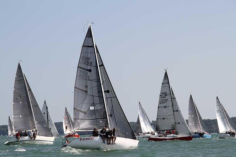 Coutts Quarter Ton Cup 2015 action photo copyright Fiona Brown / www.fionabrown.com taken at Royal Ocean Racing Club, Cowes and featuring the Quarter Tonner class