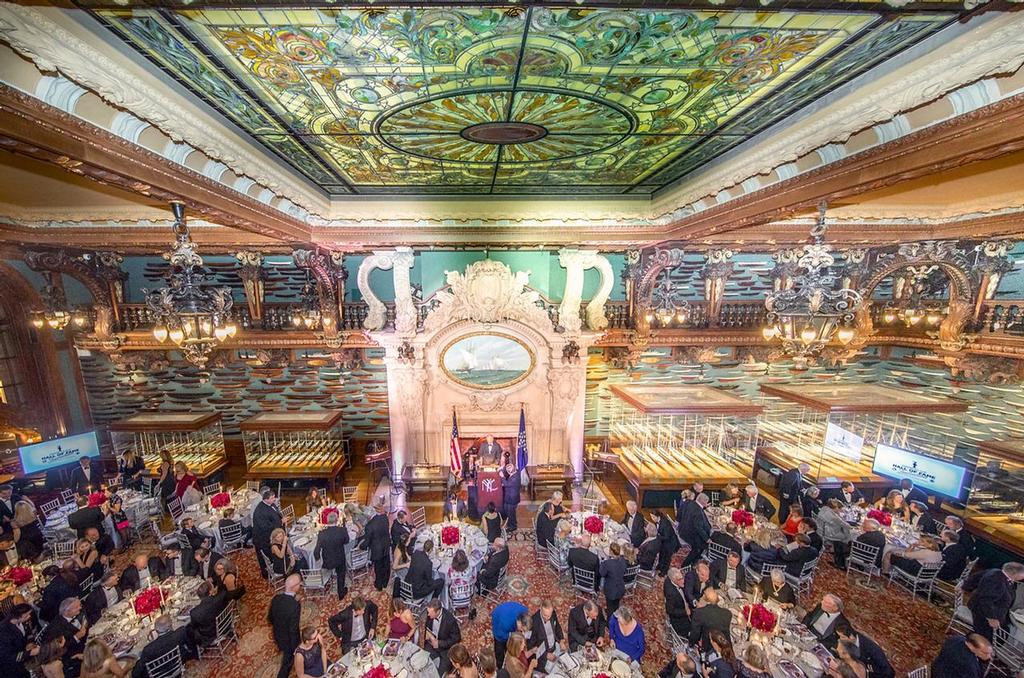 The America’s Cup Hall of Fame induction was held at the New York Yacht Club’s magnificent Model Room. Measuring forty-five feet wide and ninety-six feet deep, the Model Room holds most of the Club’s collection of approximately 1,300 models—including fully-rigged models of Cup challengers and defenders. The galleon-style bay windows and the carvings of dolphins, shells, and clouds punctuated with lightning bolts, create the impression, as one visitor observed, that “except for the absence of motion, one might fancy oneself at sea.” - Hall of Fame induction for Ernesto Bertarelli Alinghi and Lord Dunraven photo copyright Carlo Borlenghi http://www.carloborlenghi.com taken at  and featuring the  class