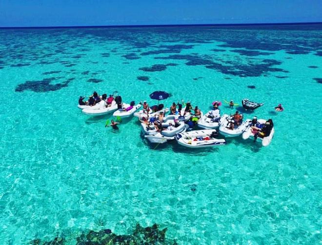 The Riviera cruising lifestyle - a tender raft-up at Lady Musgrave © Riviera Australia
