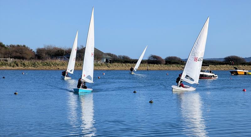 ILCA 7s approaching the finish line during the Keyhaven Yacht Club Rum Race - photo © Mark Jardine