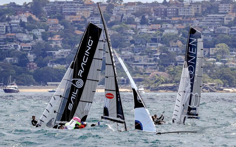 Top mark action - Sail Racing - Moonen and ImagineSignage photo copyright SailMedia taken at Manly 16ft Skiff Sailing Club and featuring the 16ft Skiff class