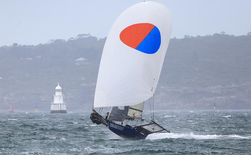 Yandoo, under spinnaker on a lone harbour last Sunday - Sixt Spring Championship photo copyright SailMedia taken at Australian 18 Footers League and featuring the 18ft Skiff class