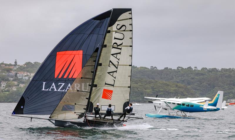 18ft Skiff NSW Championship Day 2 - Lazarus outpaces a plane - photo © SailMedia