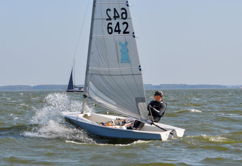 Menno Huisman powering into the IJsselmeer chop - Solo class ONK Open Dutch National Championship photo copyright Will Loy taken at Royal Netherlands Yacht Club and featuring the Solo class