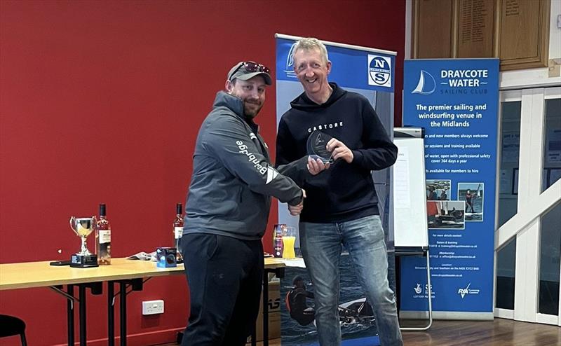 Paul Davis presents Guy Mayger with the Solo Class End of Season Championship 2024 title photo copyright Nigel Davies taken at Draycote Water Sailing Club and featuring the Solo class