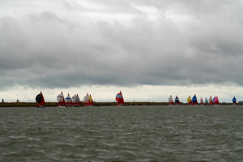 The Squibs are the largest fleet during Burnham Week 2024 photo copyright Petru Balau Sports Photography / sports.hub47.com taken at Royal Corinthian Yacht Club, Burnham and featuring the Squib class