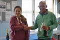 Pete Coop collects first prize from Zoe Gooden at the Winsford Flash Streaker Open © Jonathan Latham