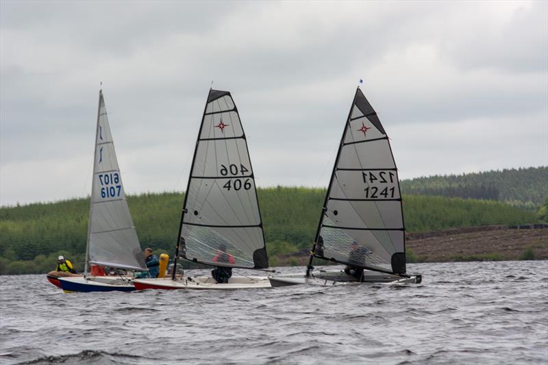 Solo takes on Supernovas during the Border Counties Midweek Sailing Series at Llyn Brenig photo copyright Pete Chambers taken at Llyn Brenig Sailing Club and featuring the Supernova class