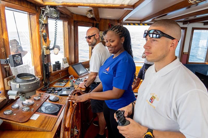 Philisande Gwala steering the Tall ship Nave Italia - photo © Merlo Fotografia