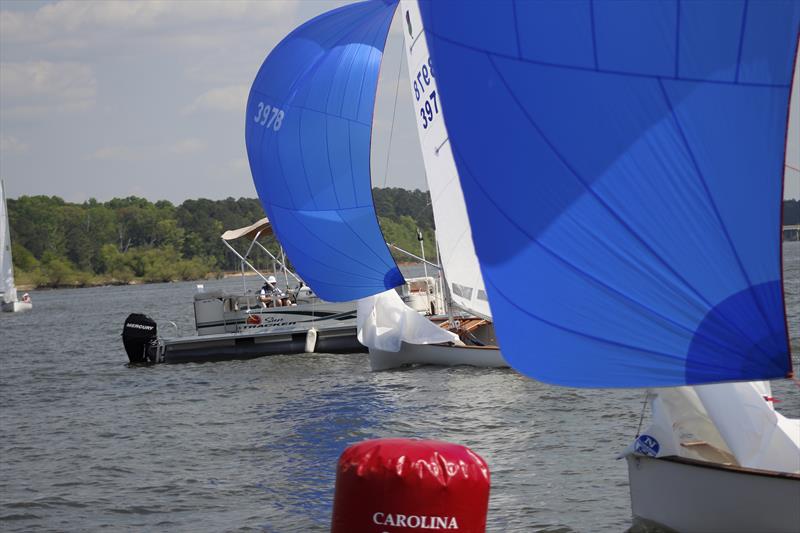 Thistle racing action on the waters of North Carolina's Jordan Lake photo copyright Kevin Sheehan taken at  and featuring the Thistle class