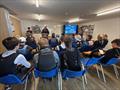 Sailors Briefing during the ITCA (GBR) Invitational Topper Coaching at Poole © Hayley Turner