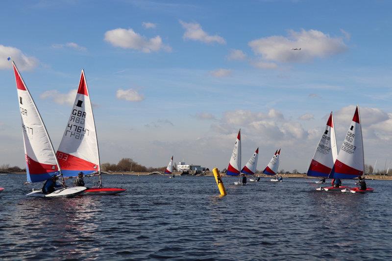 Will Sadler (48683) leading by 100m in Race 1 - Topper SE Winter Regatta at Island Barn photo copyright IBRSC taken at Island Barn Reservoir Sailing Club and featuring the Topper class