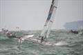 Darren Bundock and Glenn Ashby (AUS) power upwind - Medal race for the Tornado class, Qingdao 2008 © Richard Gladwell