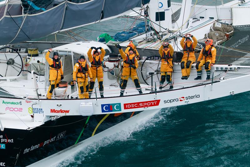 Arrival of Alexia Barrier and her crew of The Famous Project CIC Dee Caffari, Annemieke Bes, Deborah Blair, Molly LaPointe, Támara Echegoyen, Stacey Jackson and Rebecca Gmür Hornell - aboard Maxi Trimaran IDEC Sport off Ouessant, after Jules Verne Trophy - photo © Lloyd / Jmliot Images / CIC
