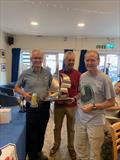 Ian Simpson and Dave Bardwell with WYC Commodore David Figgis, on presentation of the trophy during the Wanderer Open at Whitstable © Elizabeth Doggart