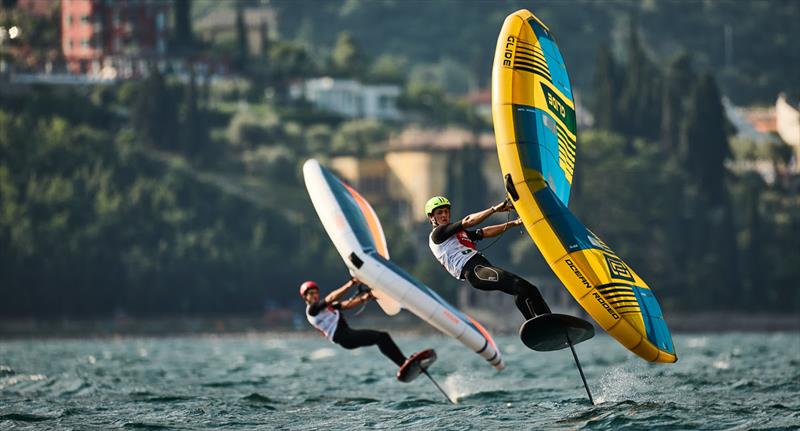 Mathis Ghio being chased hard by Nicolo Spanu - Pascucci WingFoil Racing World Cup Campione del Garda 2023 - Day 2 photo copyright IWSA media / Robert Hajduk taken at Campione Univela and featuring the Wing Foil class