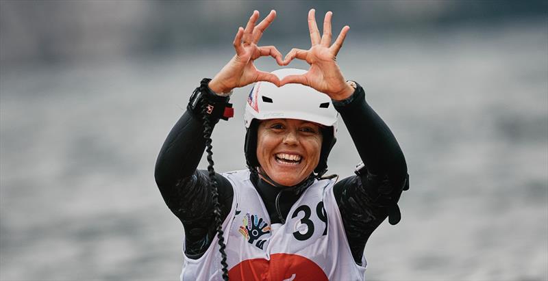 Montse Sole showing the love for winging - 2023 Pascucci WingFoil Racing World Cup Campione del Garda, Day 3 photo copyright IWSA media / Robert Hajduk taken at Campione Univela and featuring the Wing Foil class