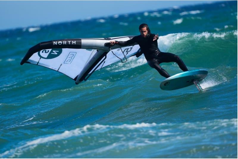 Lumps and bumps, cranking turns and riding waves. Fabi Muhmentahler surfs the turquoise 2025 Swell - photo © Andy Troy