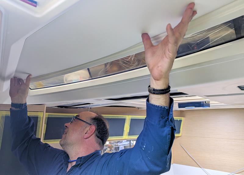 Ceiling panels and padding being cut to size and hand finished - photo © Mark Jardine